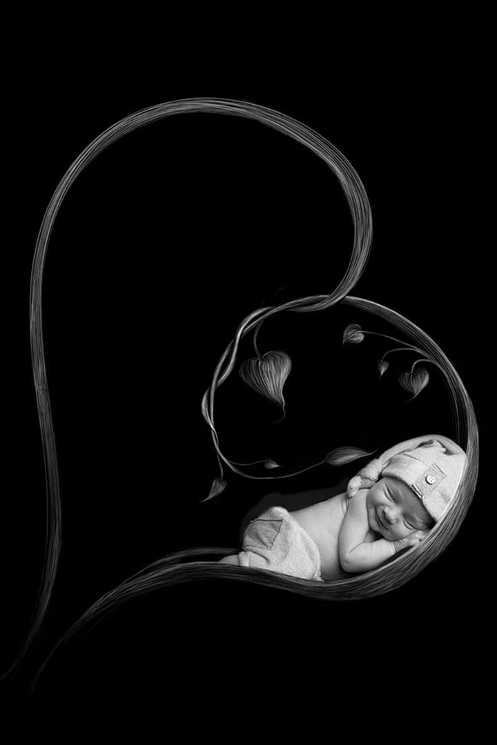 Newborn baby sleeping in black and white portrait by Newborn Photographer Bradford